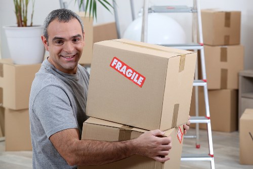 Organised boxes and labelled belongings prepared for relocation
