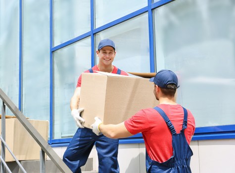 Professional piano moving team handling access and parking challenges near West Hampstead homes