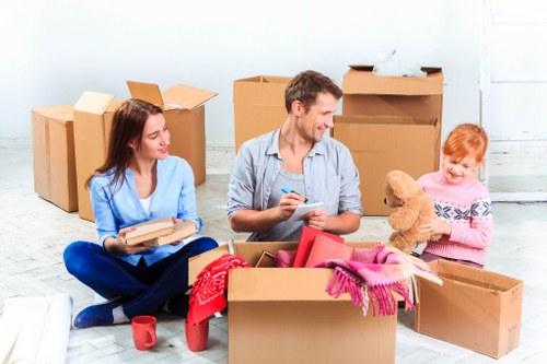 Local movers loading furniture for a West Hampstead relocation