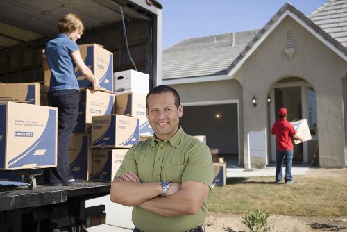 Packing office furniture and equipment for a local business move