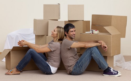 Organised packing boxes and labels for a move in West Hampstead