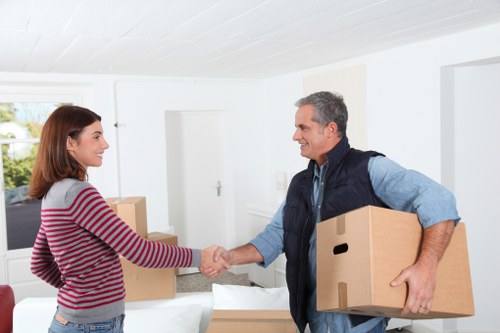 Furniture loading and transport with a moving truck in West Hampstead