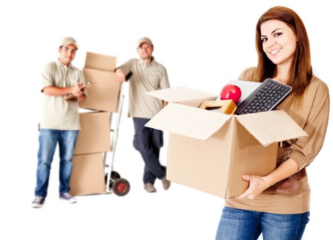 Courier van used for a house move with packed boxes