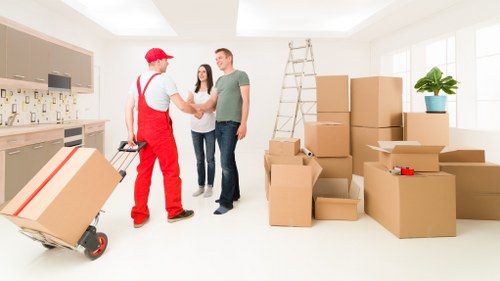 Professional movers assisting with a local West Hampstead transport job