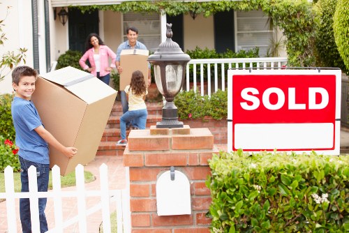 Trained moving staff handling furniture carefully