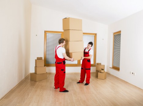 Preparing for a local office move with labelled boxes and furniture